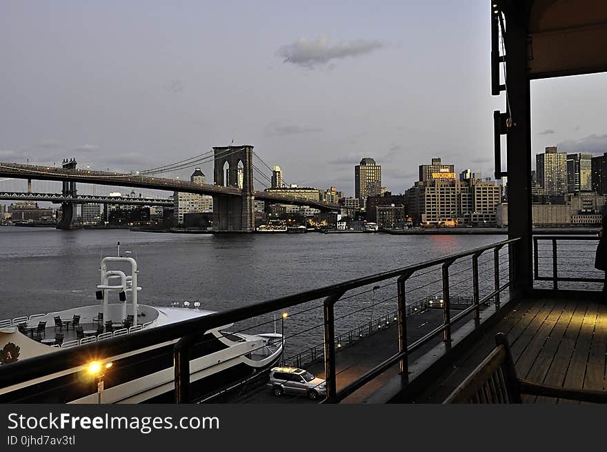 Suspension Bridge Near City Buildings