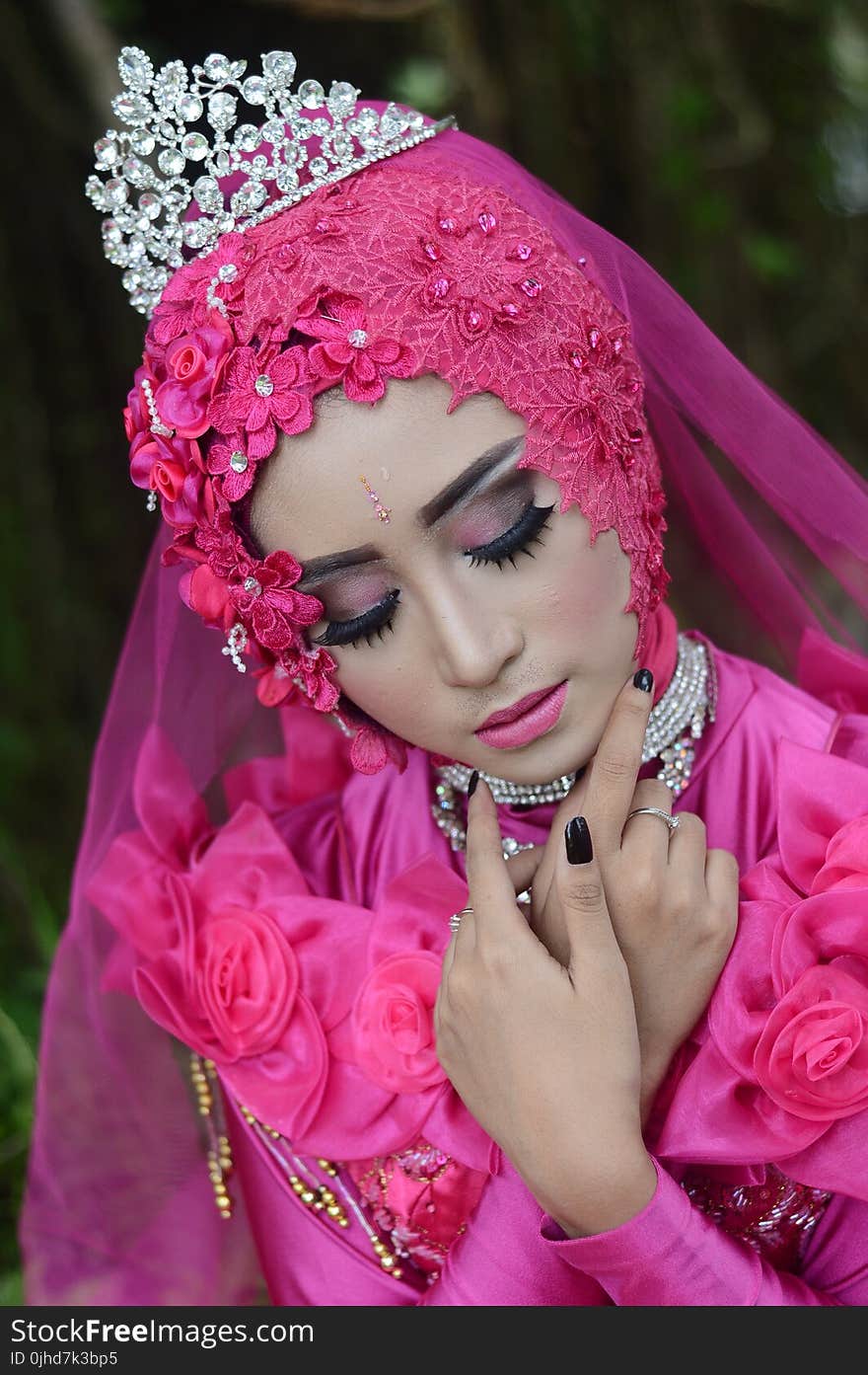 Woman In Pink Traditional Dress Wearing A Tiara