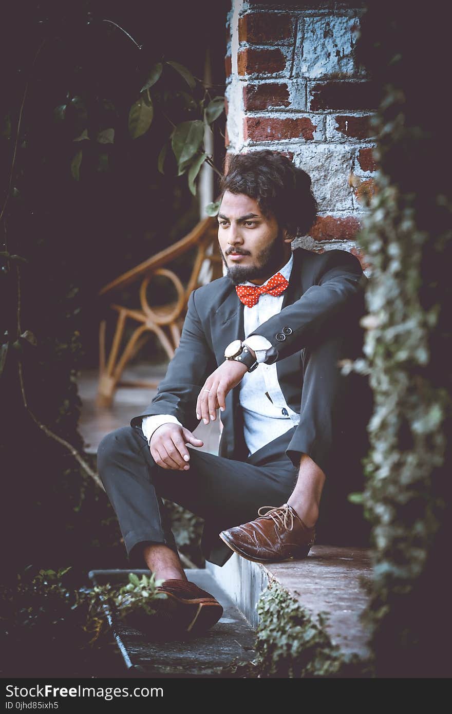 Man Wearing Black Formal Suit Jacket and Black Dress Pants