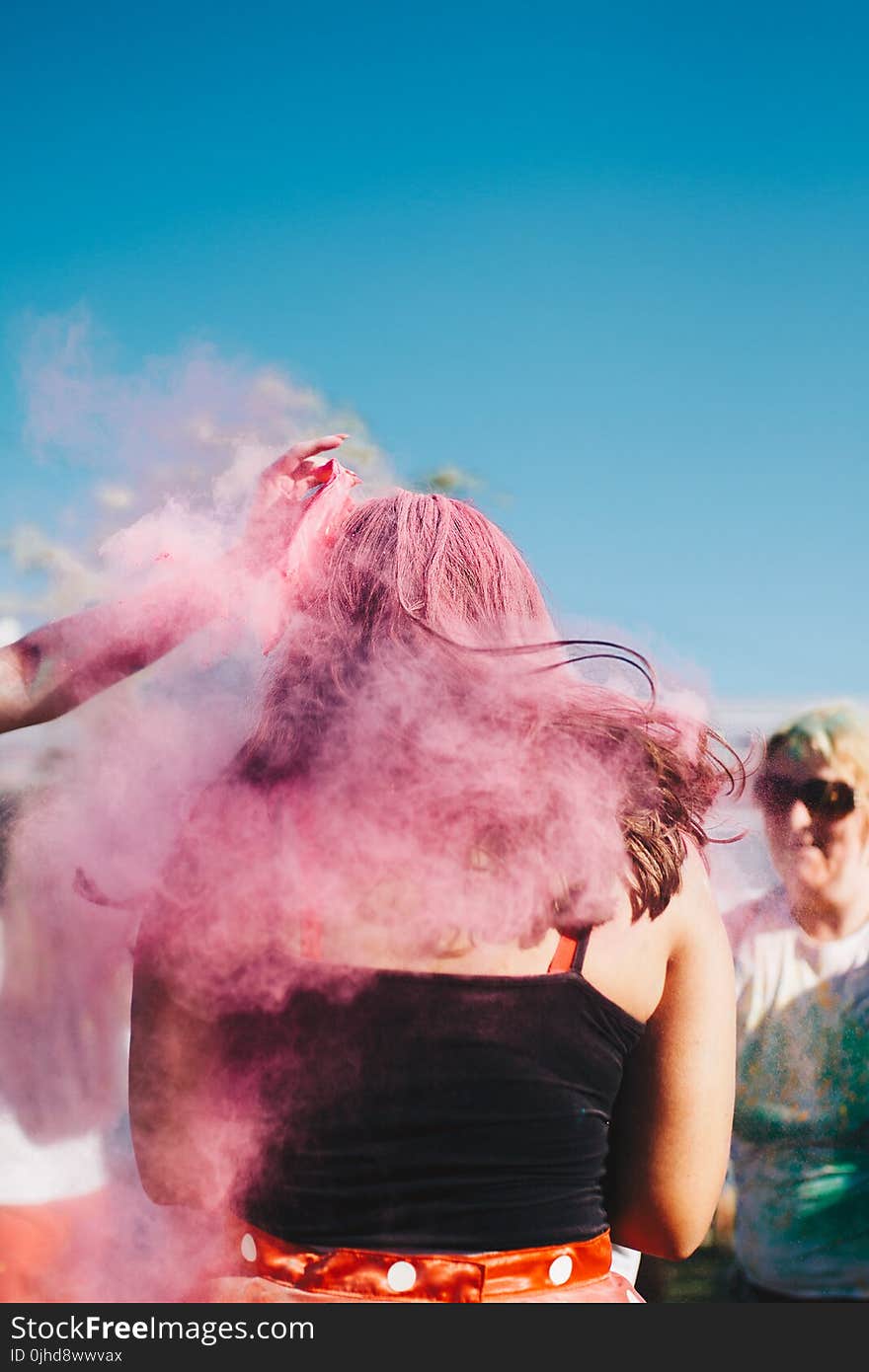 Woman Hair Covered With Pink Powder