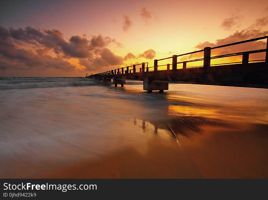 Silhouette Of Pier