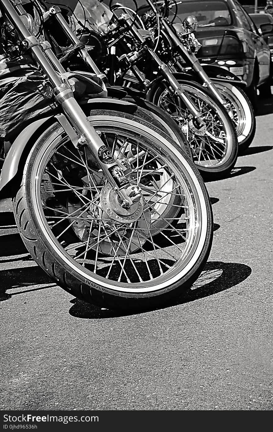 Grayscale Photo of Parked Motorcycle