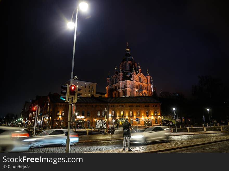 Building on Night Time With Cars Passing