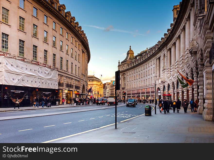 Photo of People Walking in the Street