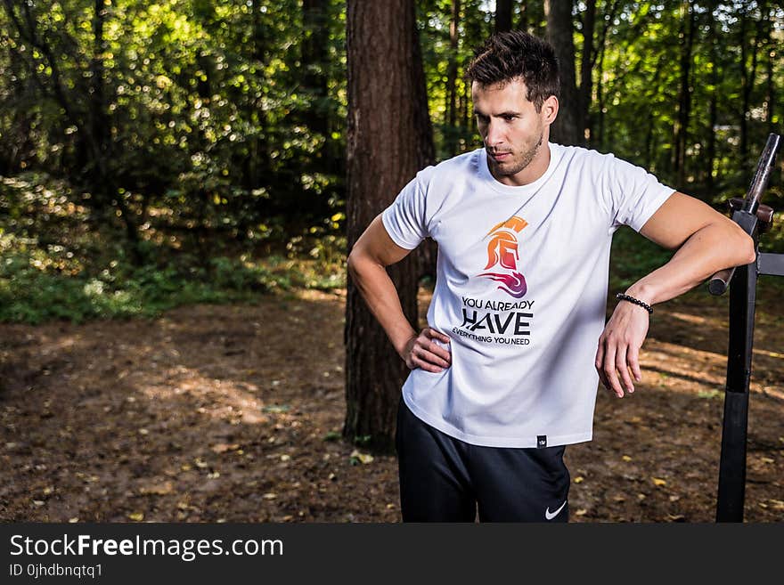 Man Wearing White Crew-neck T-shirt