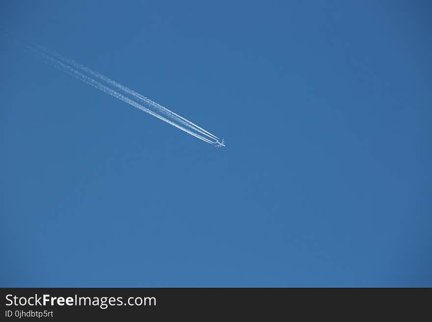 Jet On Mid Air With Smoke Trace