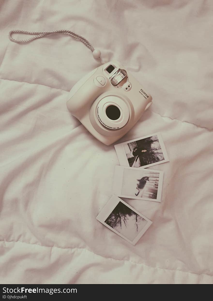 Photo of White Fujifilm Instax Camera