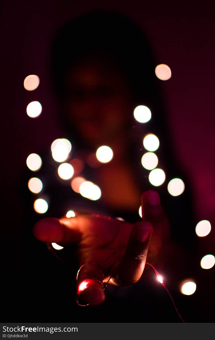 Close-Up Photography of Hand With Lights