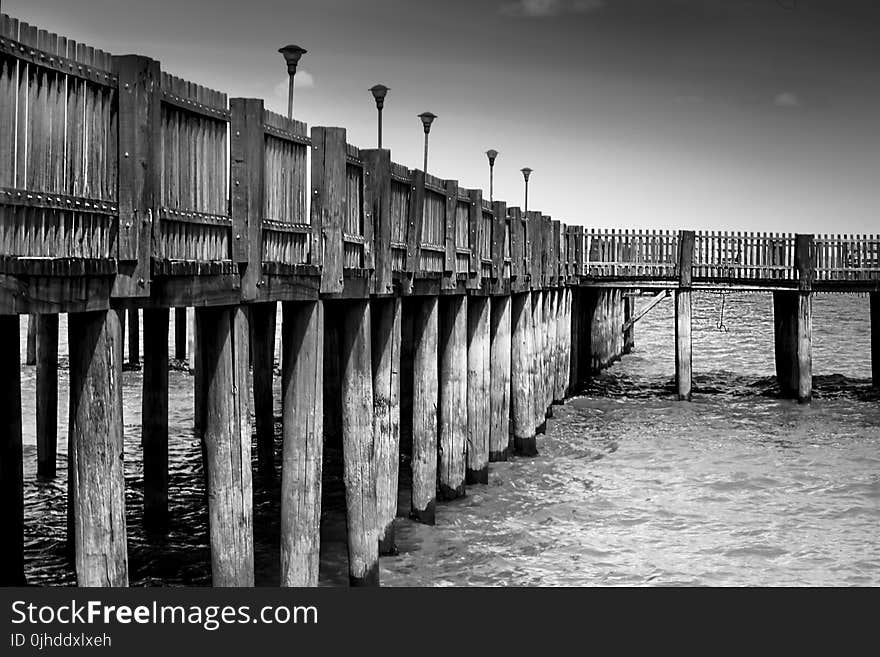 Gray Scale Photo of a Dock