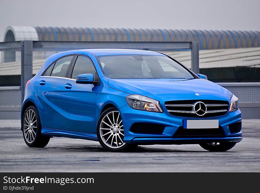 Photography of a Blue Mercedes-benz 5-door Hatchback