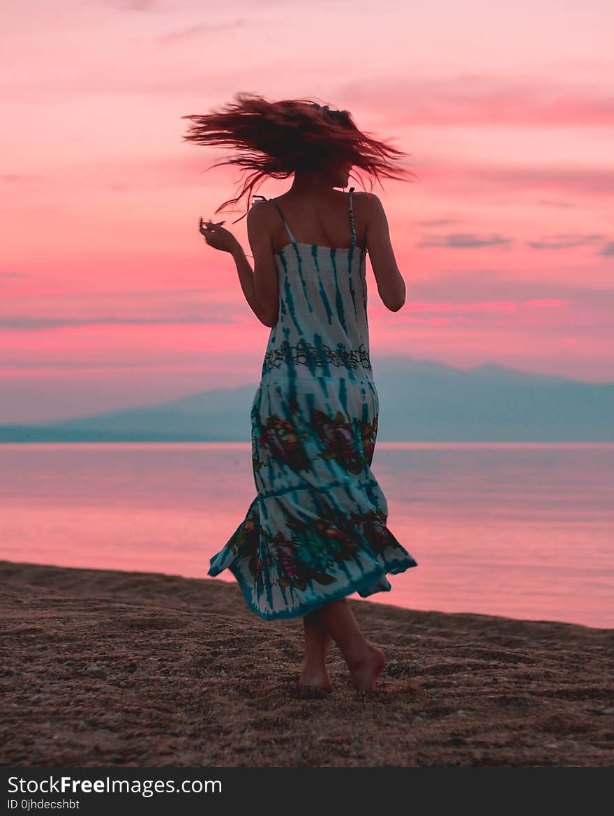 Photo of Woman Wearing Tie Dye Dress