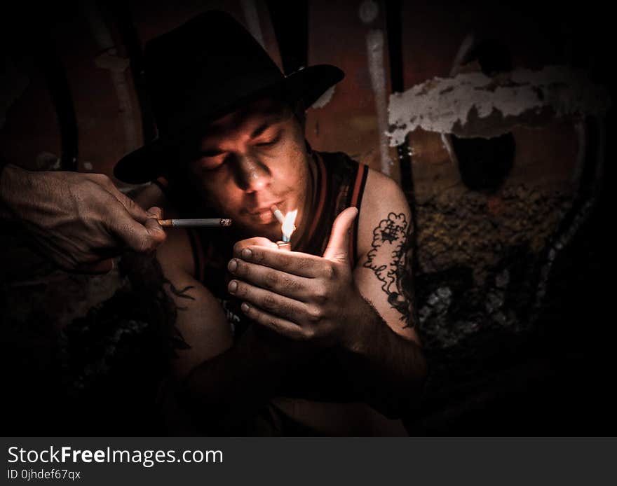 Man Lighting Cigarette