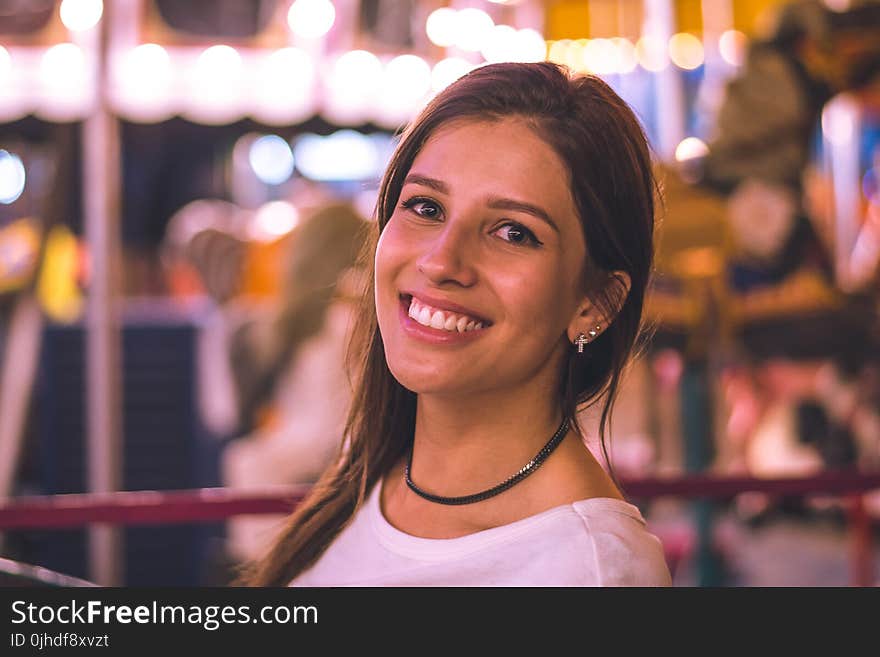 Close-Up Photography of a Woman Smiling