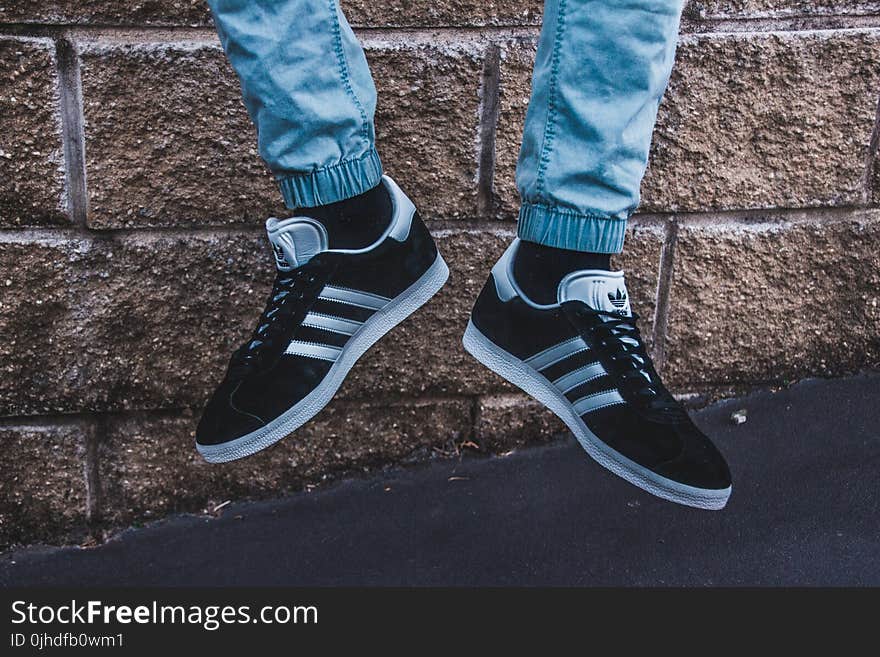 Photography of a Person Wearing Adidas Gazelle