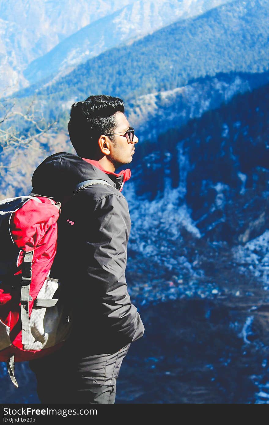 Man in Black Jacket Taking Selfie on Top of Mountain