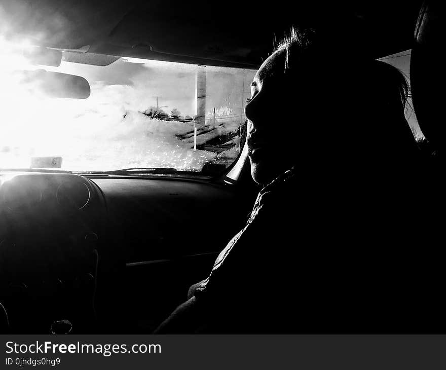 Woman Inside Car Grayscale Photo