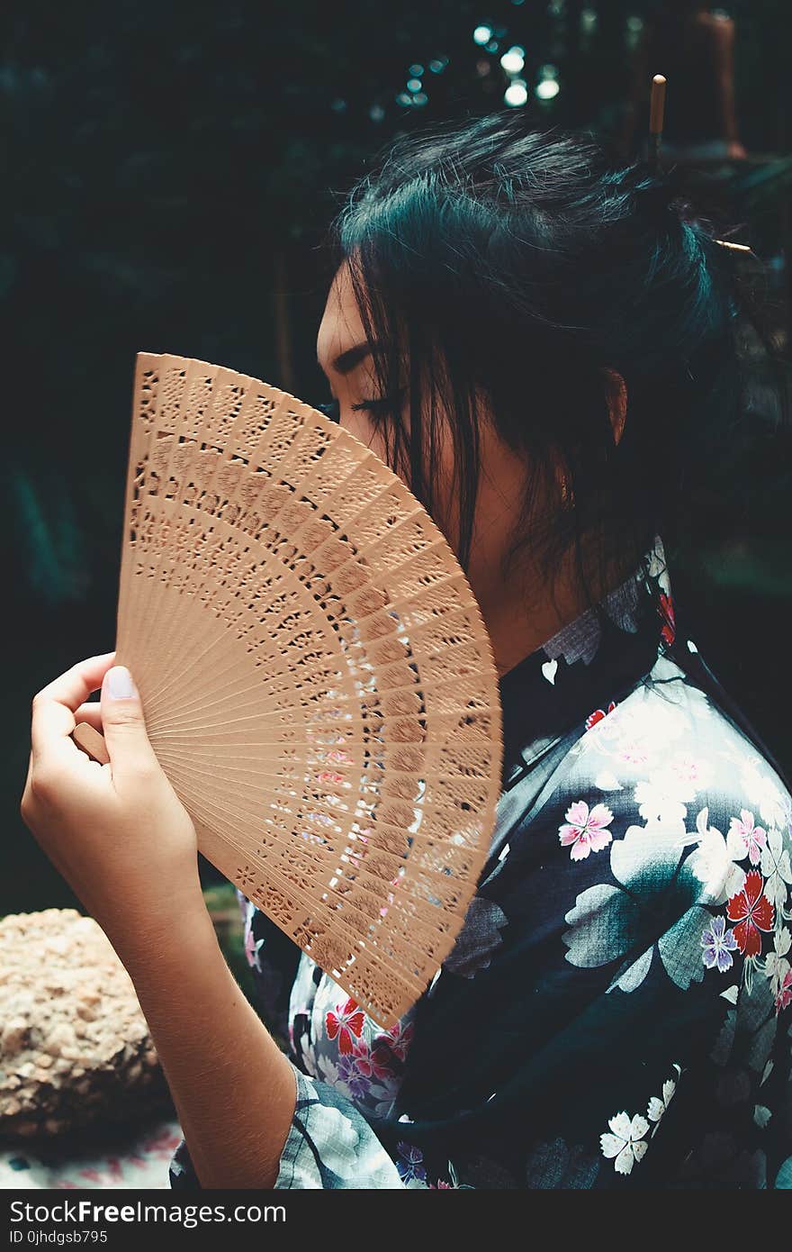 Japanese Woman Holding Brown Hand Fan