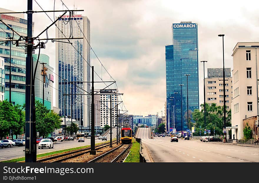 High Rise Buildings Under Gray Cloudy Sky