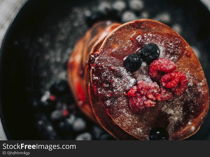 Selective Focus Photography of Raspberry and Blueberry Pancakes