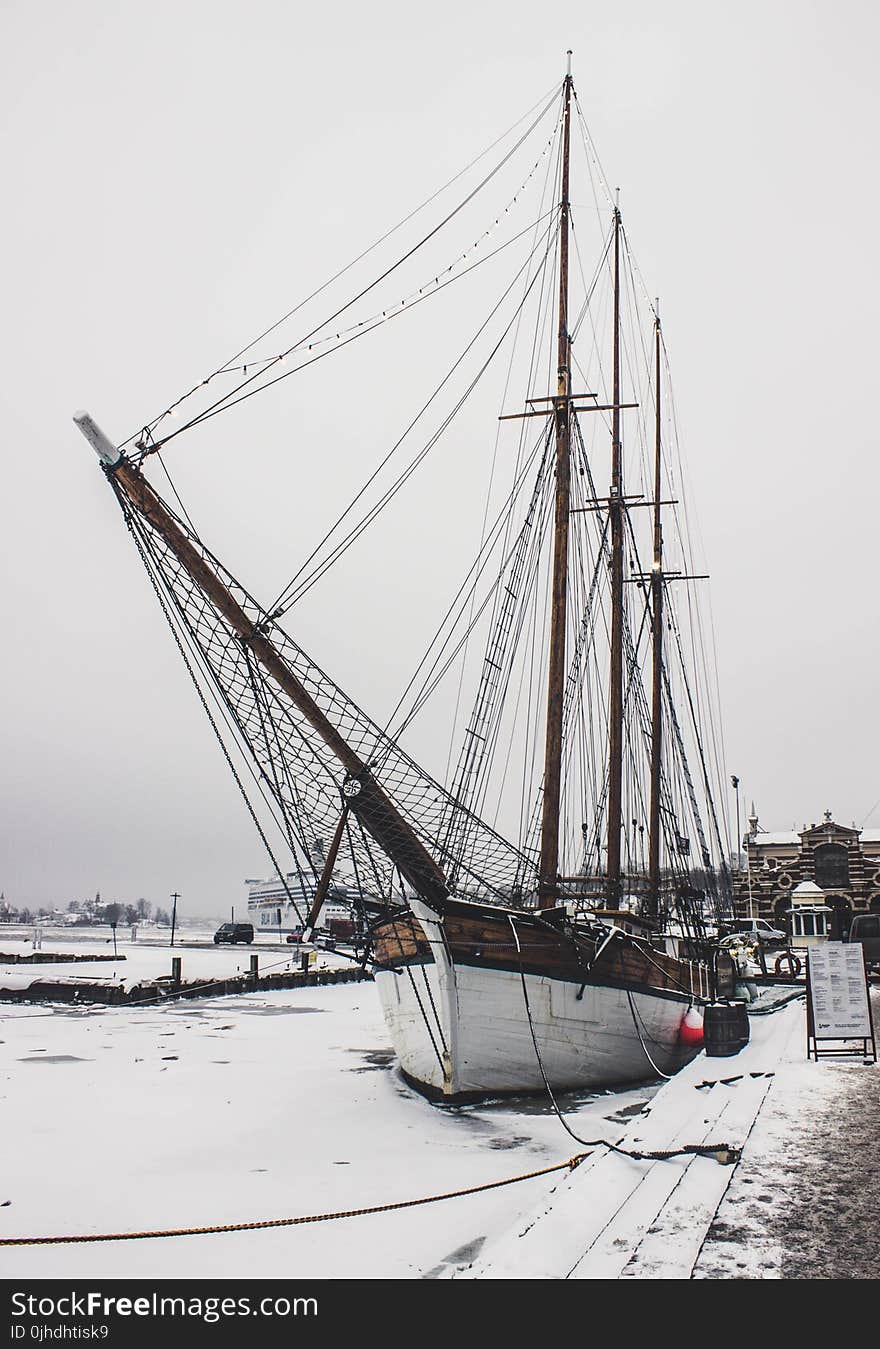 White and Brown Wooden Ship