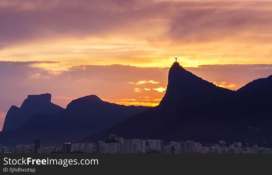 Silhouette of Mountains With Cross