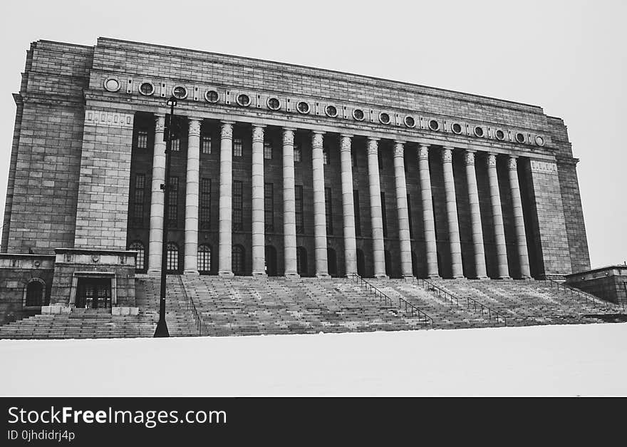 Greyscale Photo Of Concrete Building