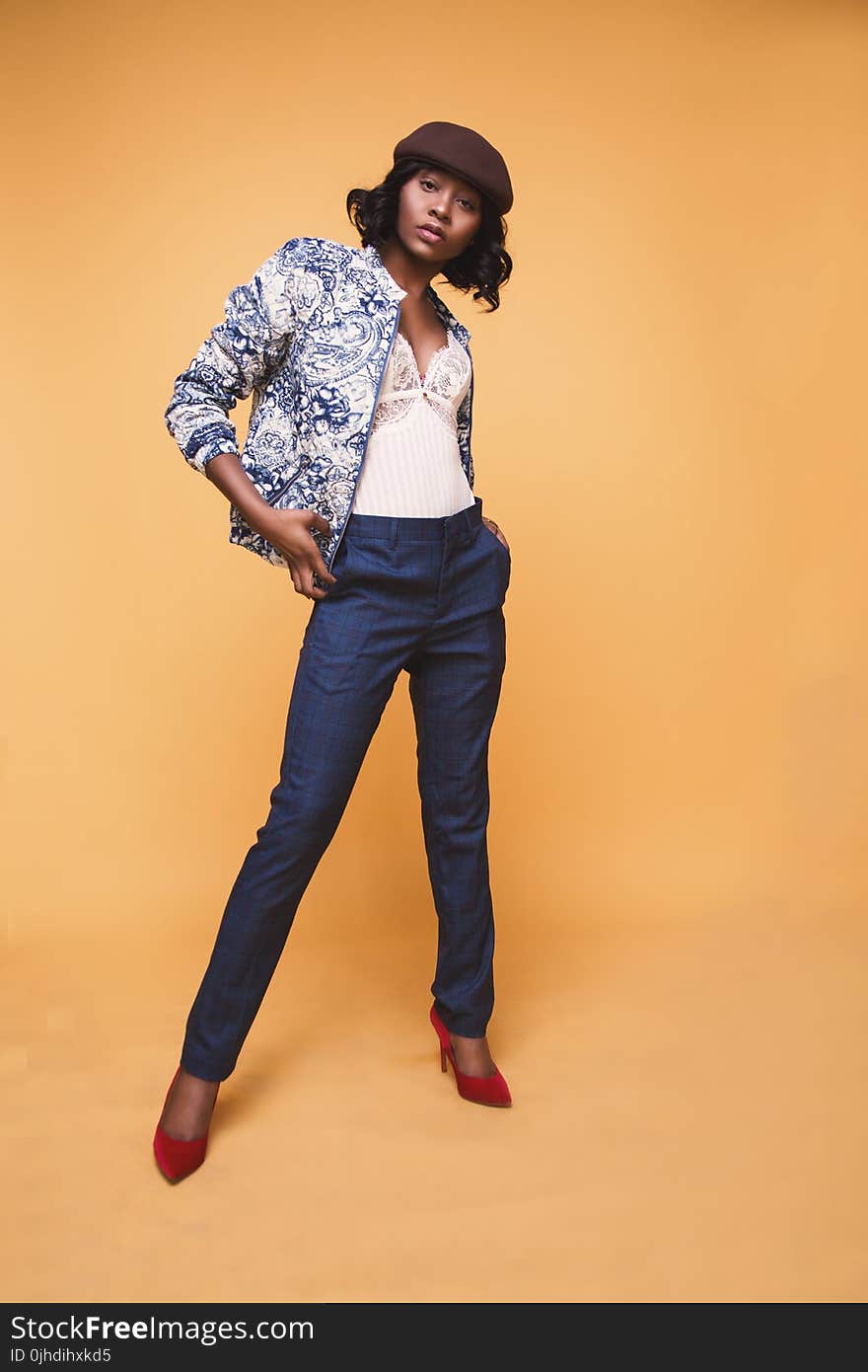 Woman in Blue and White Jacket and Blue Dress Pants