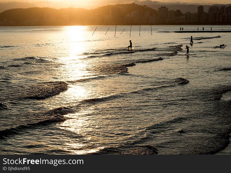 Photography of Body of Water during Sunset