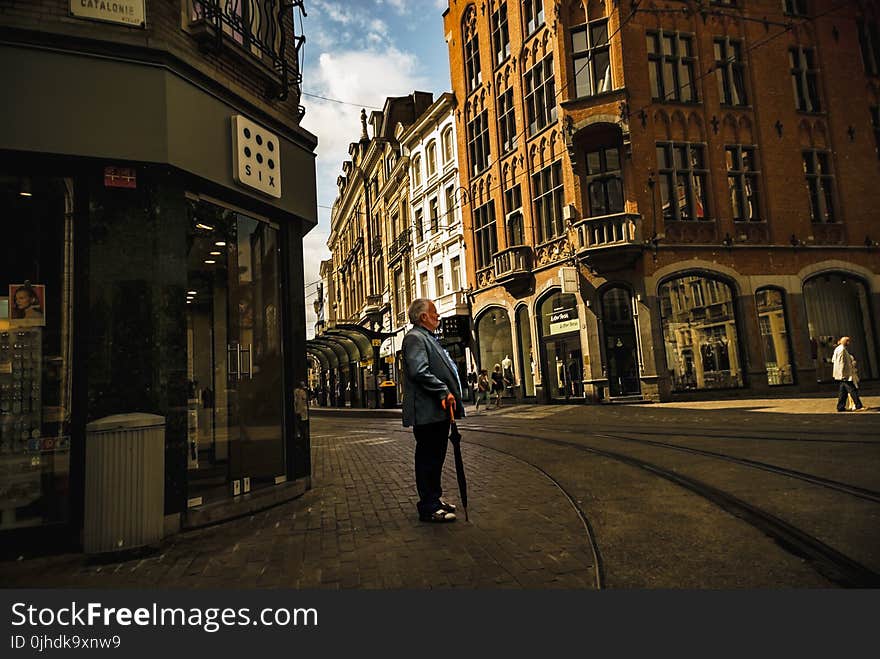 Man Holding Umbrella