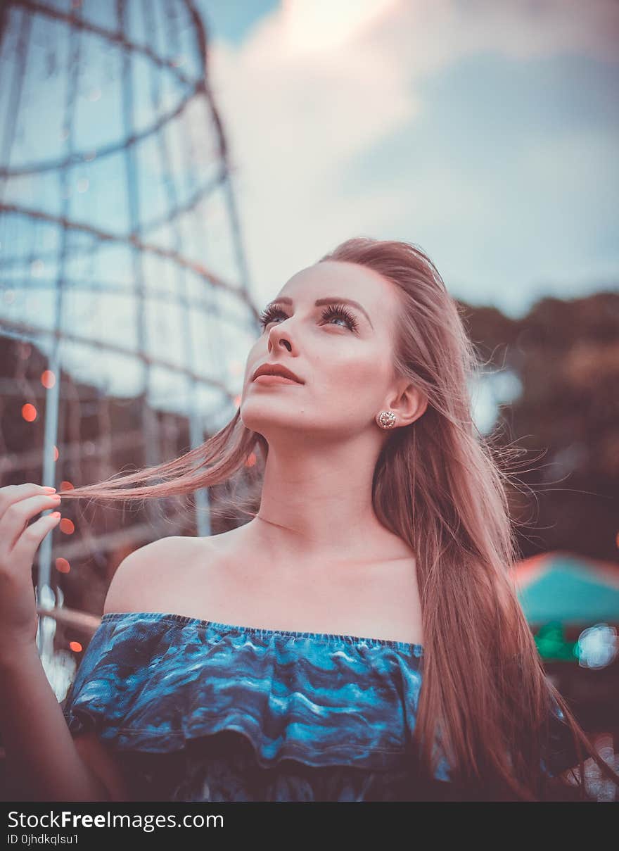 Woman in Blue Off-shoulder Printed Dress