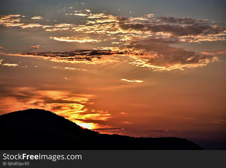 Mountain Ruin Silhouette during Golden Hour