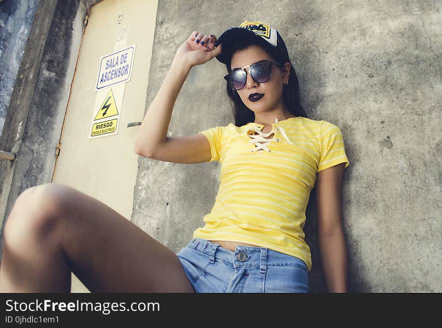 Woman Wearing Yellow Lace-up Neckline T-shirt