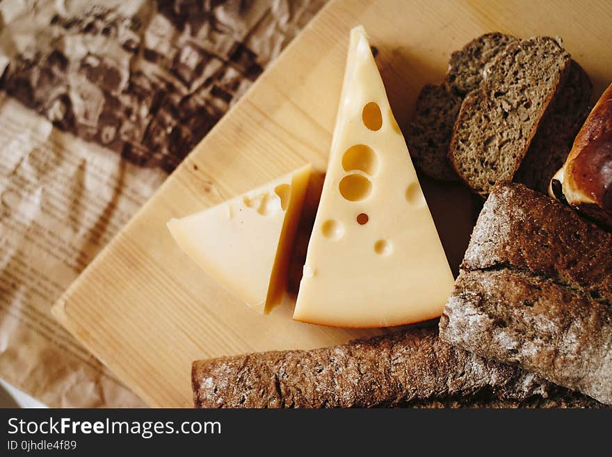 Sliced Cheese on Brown Table Top