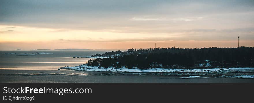 Panoramic Photo Of Island During Golden Hour