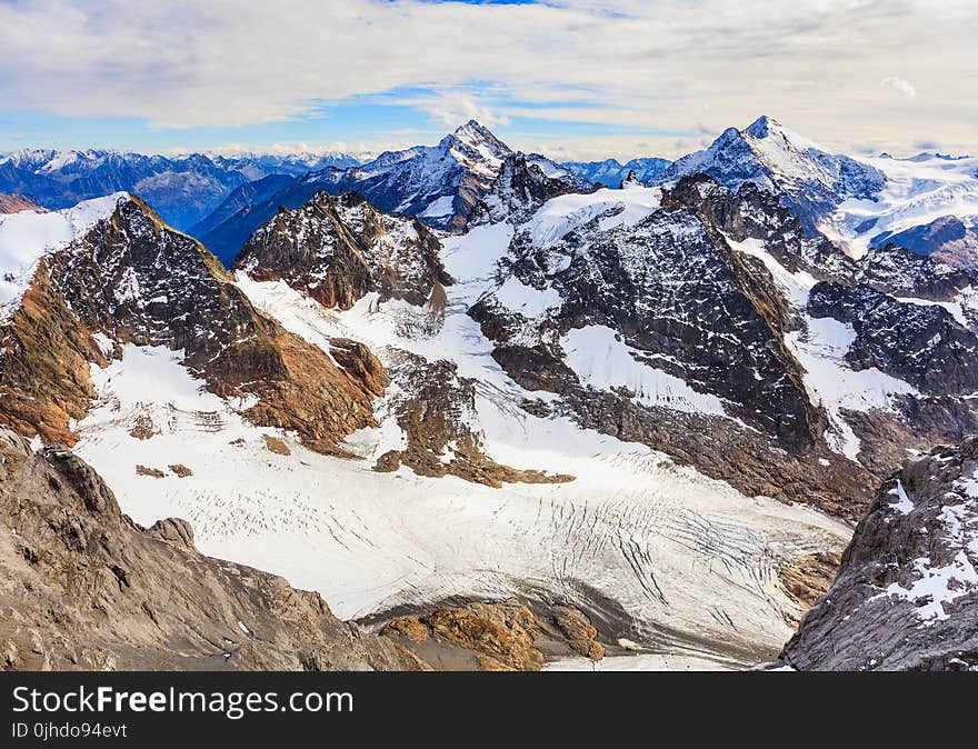 Brown Mountains Under White Sky