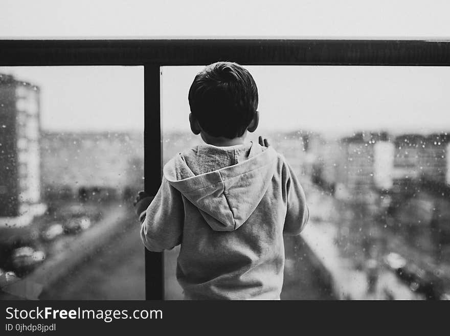 Boy Wearing Gray Hoodie