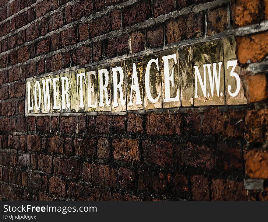 Lower Terrace Signage On Brick Wall