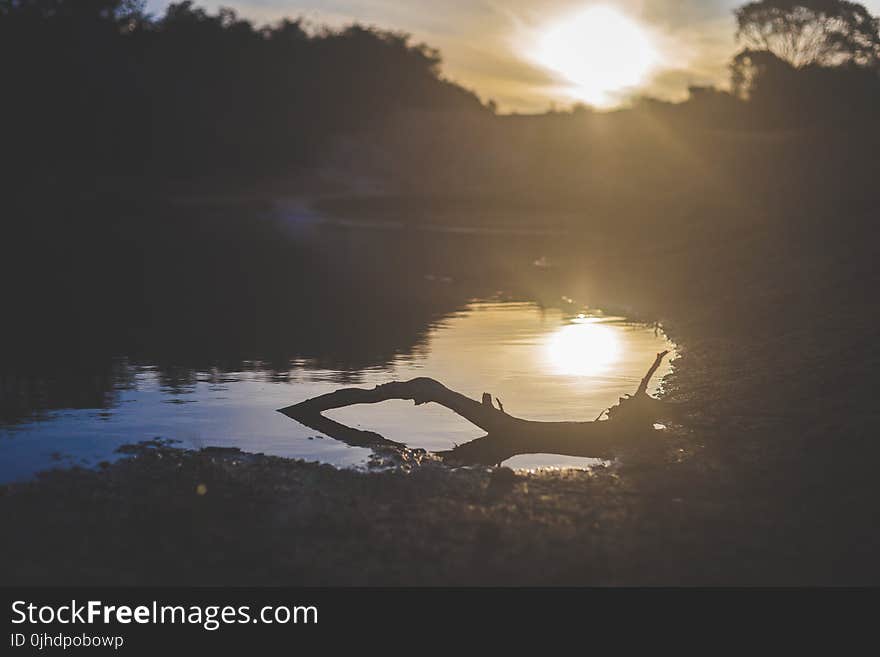 Photography of Body of Water during Sunset