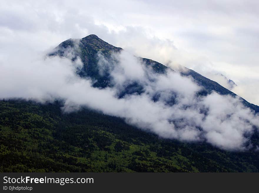 White Clouds over Black Mountain