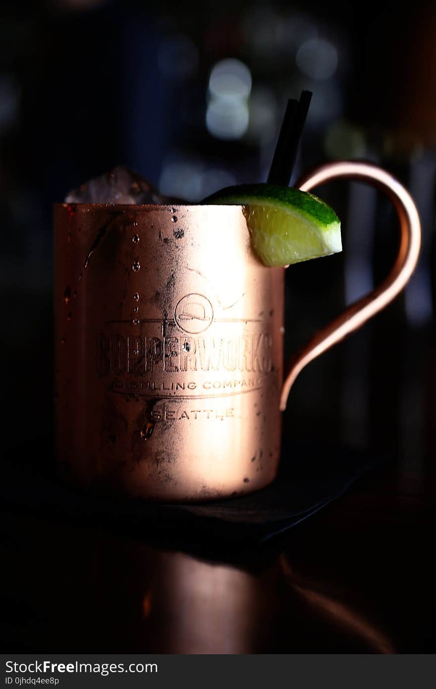 Copper-colored Mug on Table