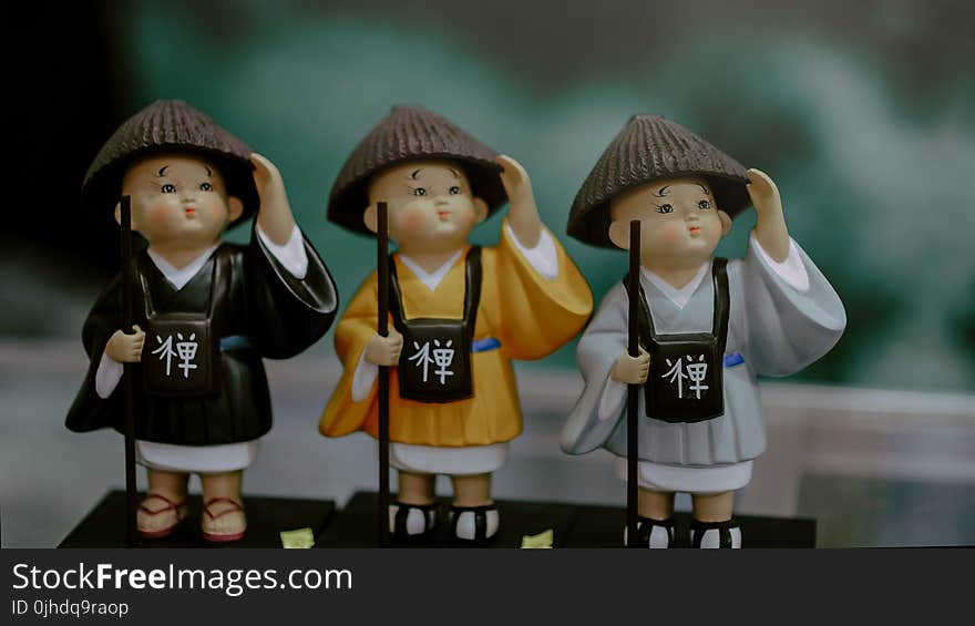 Three Children in Brown Traditional Hats Toy Miniatures