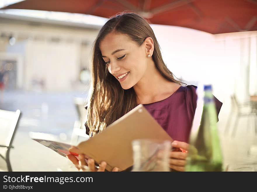 Photography of a Smiling Woman