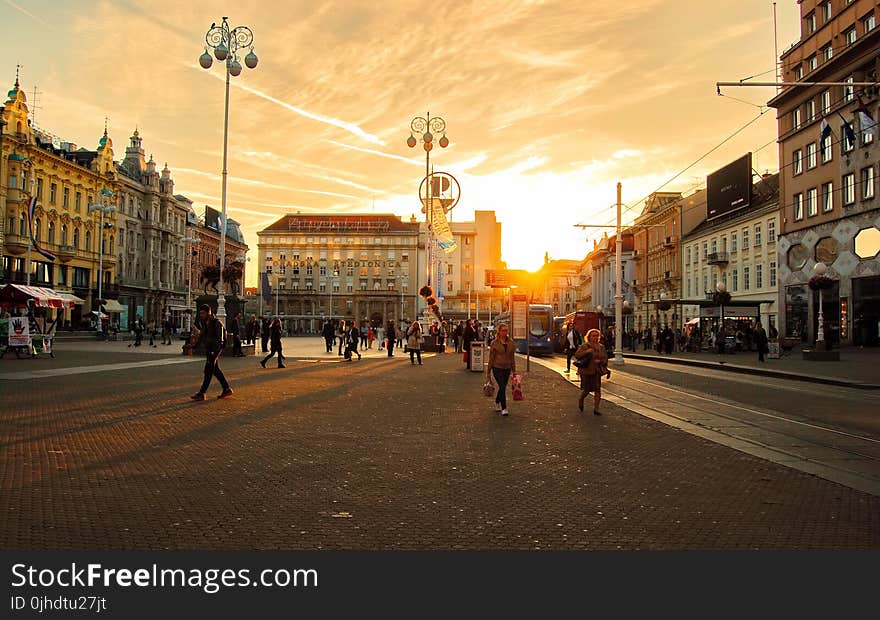 People On The Street During Sunset