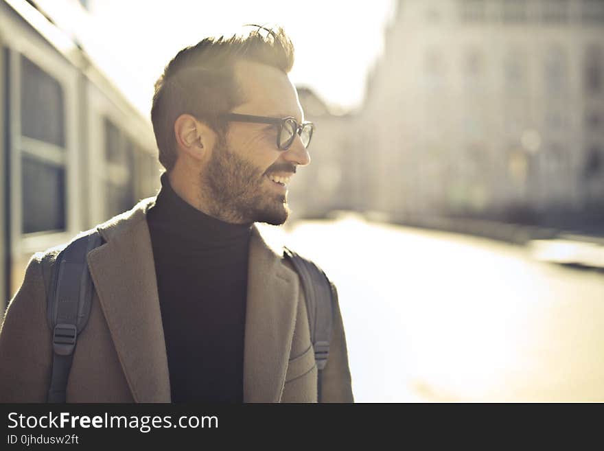 Shallow Focus Photography of Man Wearing Eyeglasses