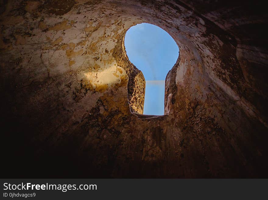 Cave With Hole at the Top Photo