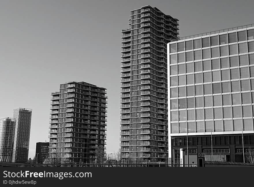 Grayscale Photo of High Rise Buildings