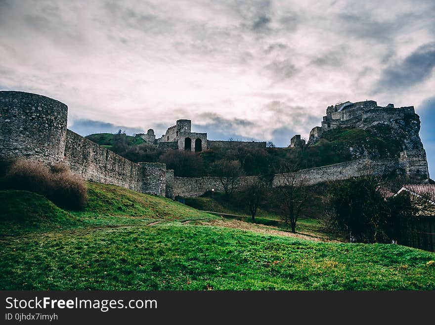 Gray Castle Under Cloudy Sky