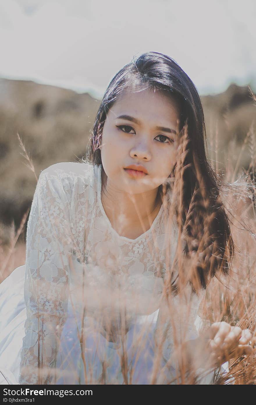 Photography of a Woman Wearing White Dress