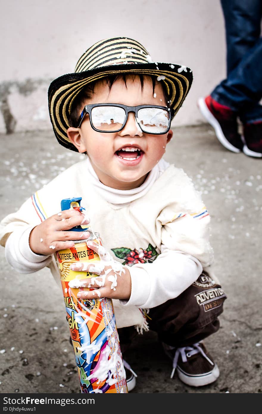 Photography of Kid Wearing Sunglasses