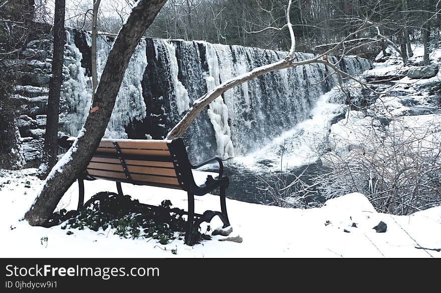 Snow Covered With Brown and Black Steel Couch